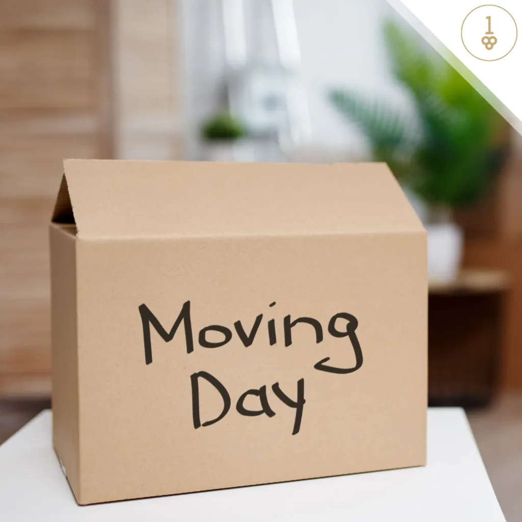 A moving box with the words " moving day ".